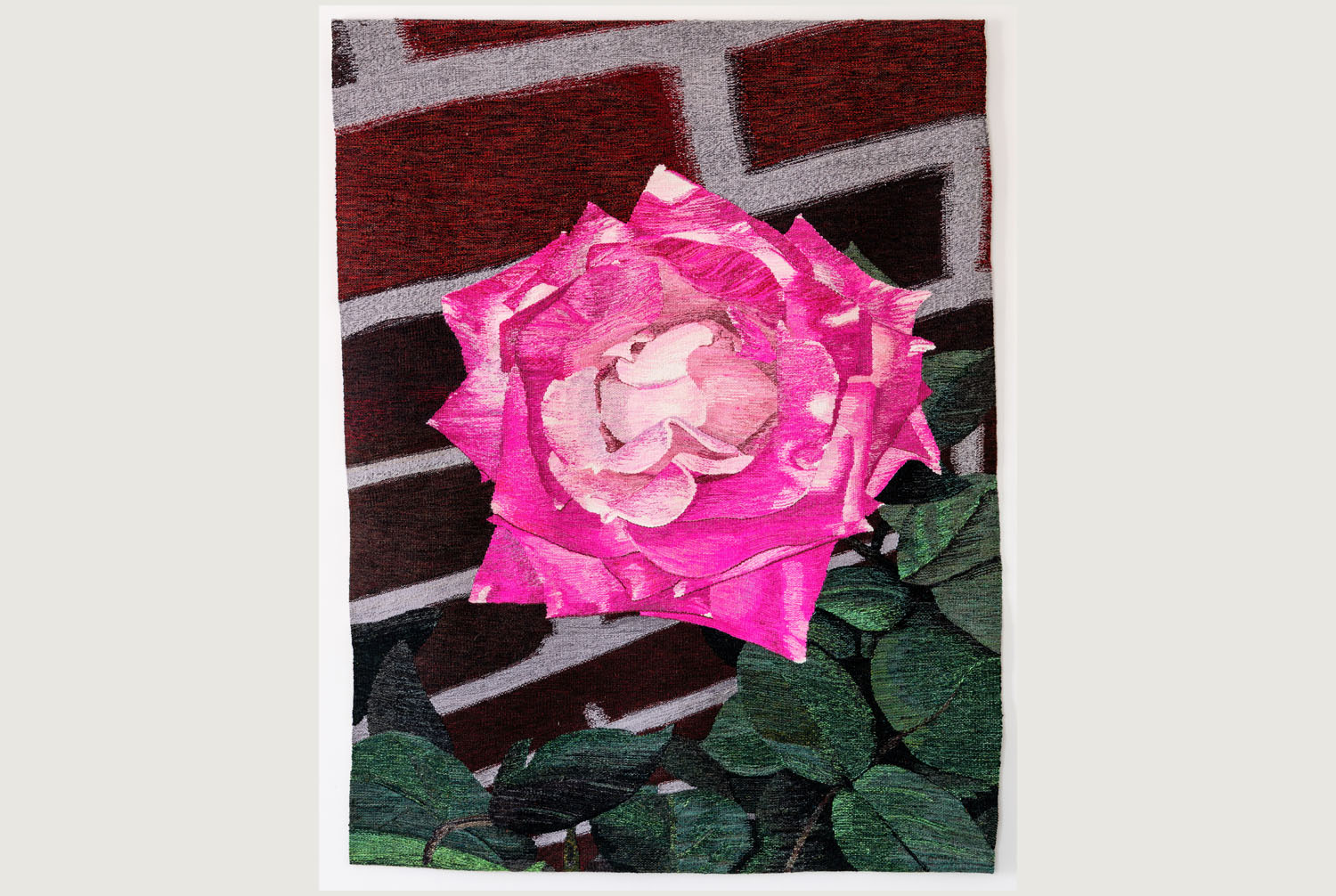 woven rug with an image of a rose